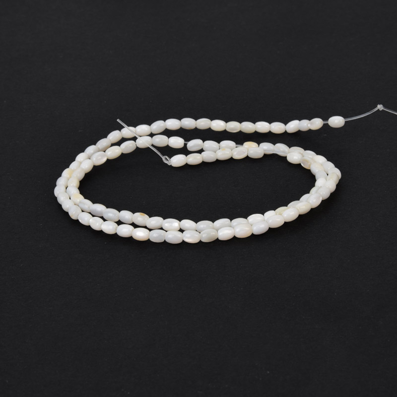 Намистини Перламутр кремовий, Натур. камінь, 4х3 мм, Рис (BUS-058130)