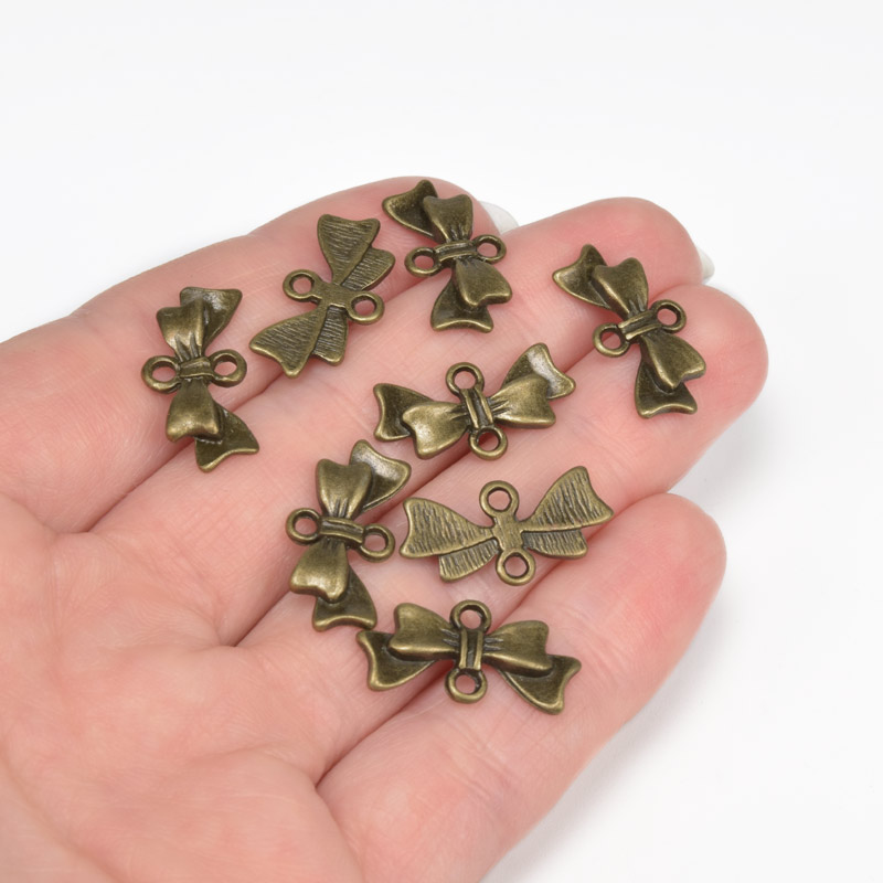 Конектори металеві Бантик, 20x10 мм, Антична бронза (KON-001838)