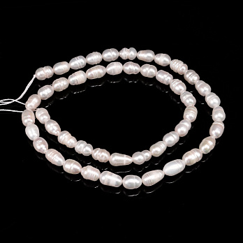 Намистини Перли річкові натуральні молочні, Рис, Клас А, 7-9х5-7 мм (35 см) (BUS-051830)